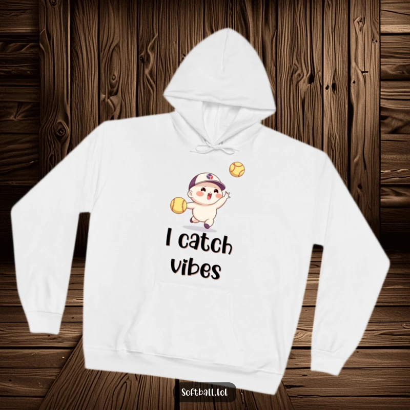 Funny softball hoodie depicting an agile character making a spectacular catch of a flying ball, blending sport and humor.