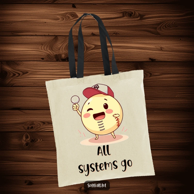 Funny tote bag design featuring a softball with a spring, hilariously attempting to pitch itself, a quirky accessory.